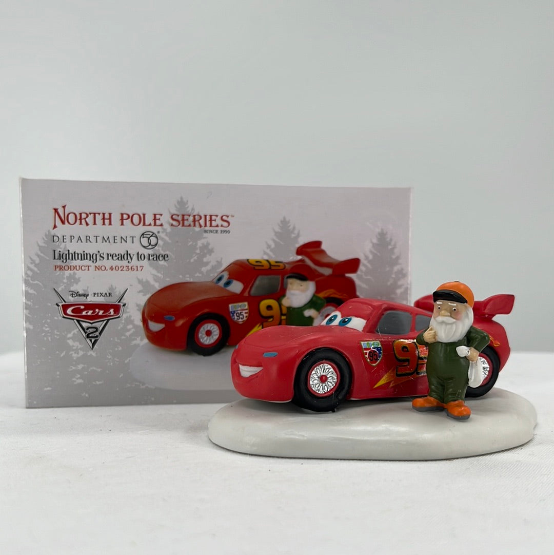 Department 56 North Pole Series Disney Pixar Cars Lightening Ready to Race, front view.