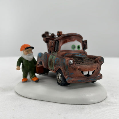 Department 56 North Pole Series Disney Pixar Cars Mater Christmas to You, Too!, front view.