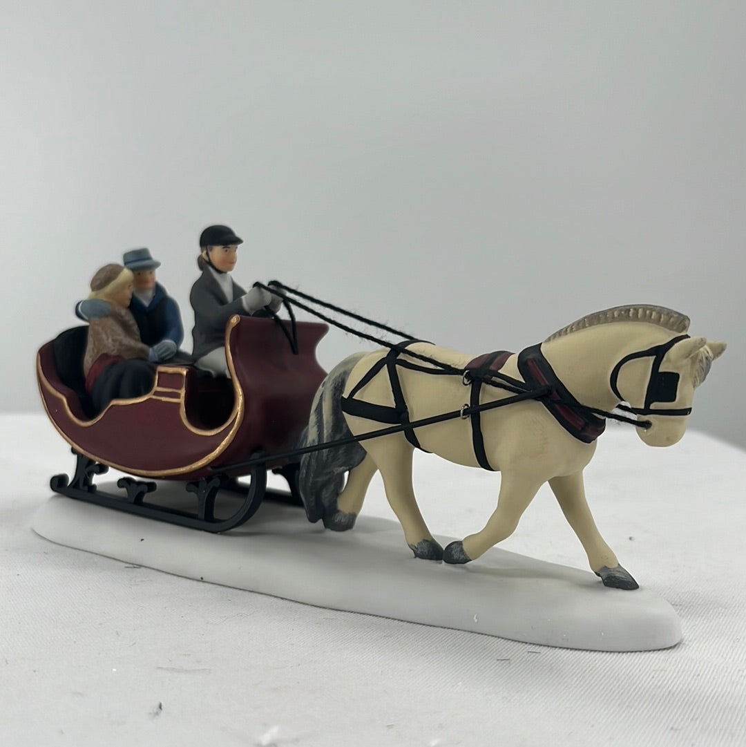 Department 56 Christmas in the City Sleigh Ride, side view.