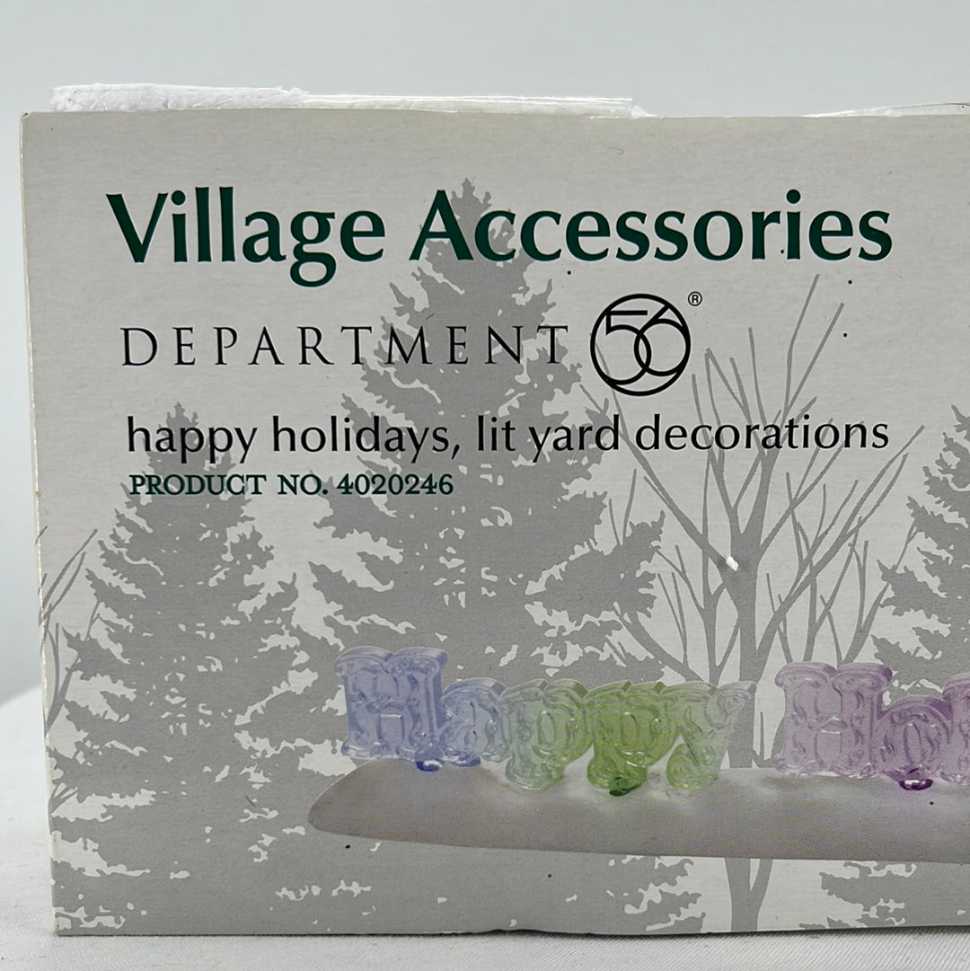 Department 56 Village Accessories Happy Holidays Lit Yard Decoration packaging, front view close-up.