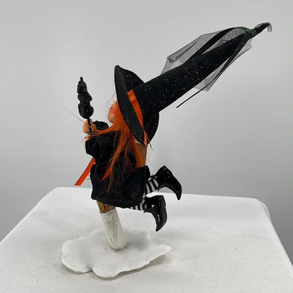 Halloween Annalee Doll Flying Witch, side view.