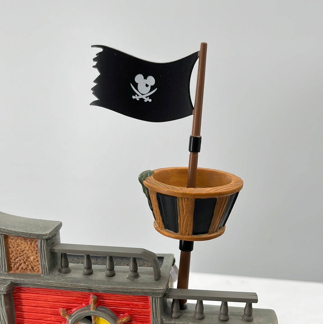 Department 56 Snow Village Halloween Mickey’s Pirate Cove lighted building detachable accessory, close-up.