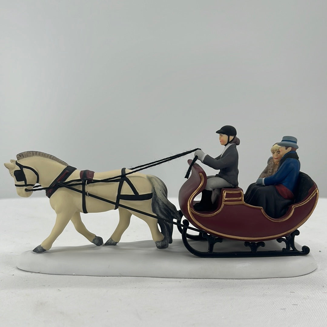 Department 56 Christmas in the City Sleigh Ride, side view.