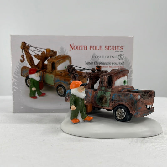 Department 56 North Pole Series Disney Pixar Cars Mater Christmas to You, Too!, side view.