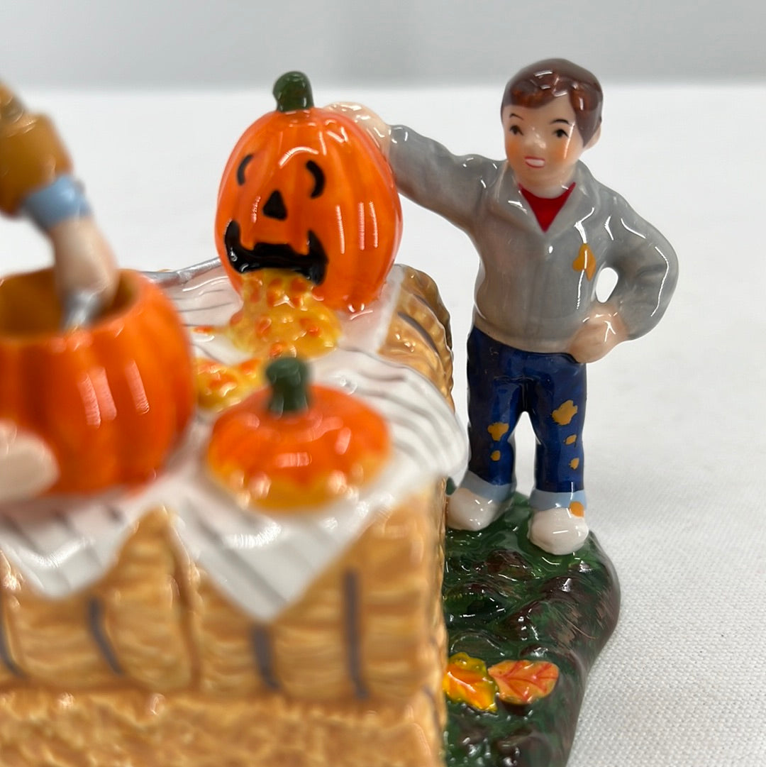 Department 56 Snow Village Halloween Gross… Pumpkin Guts ceramic accessory, front view close-up.