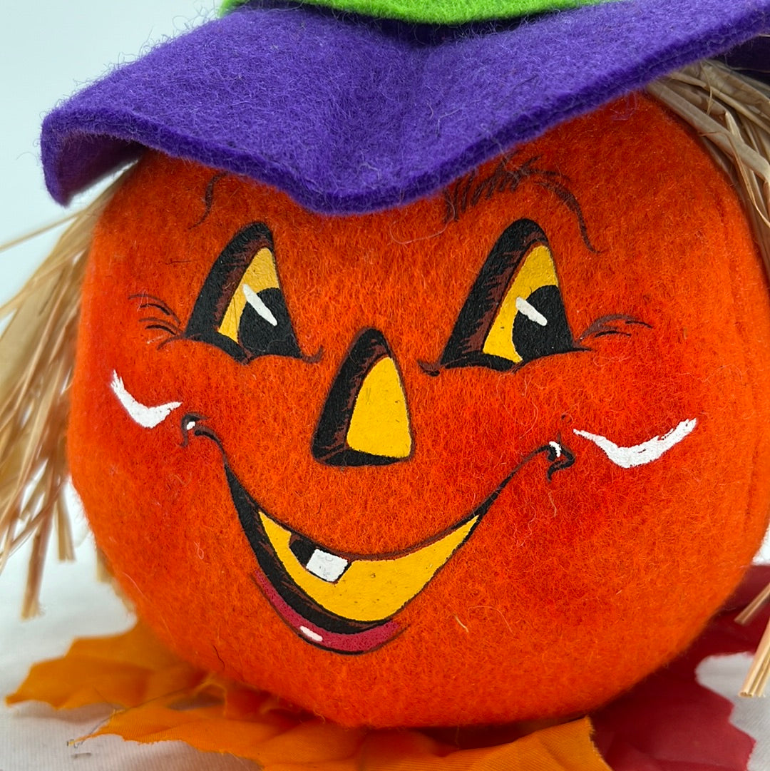 Halloween Annalee Doll Purple Witch Pumpkin, front view close-up.