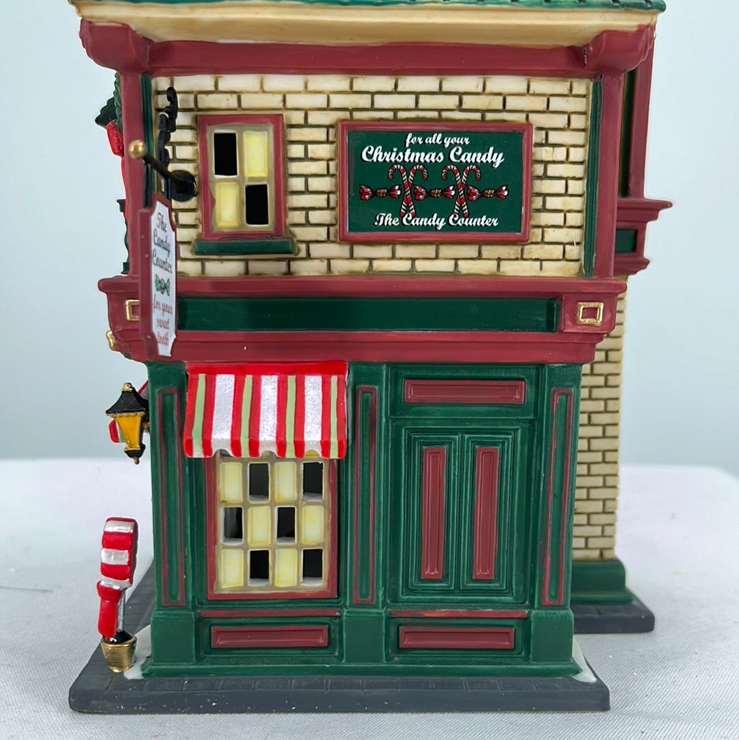 Department 56 Christmas in the City The Candy Counter, side view close-up.