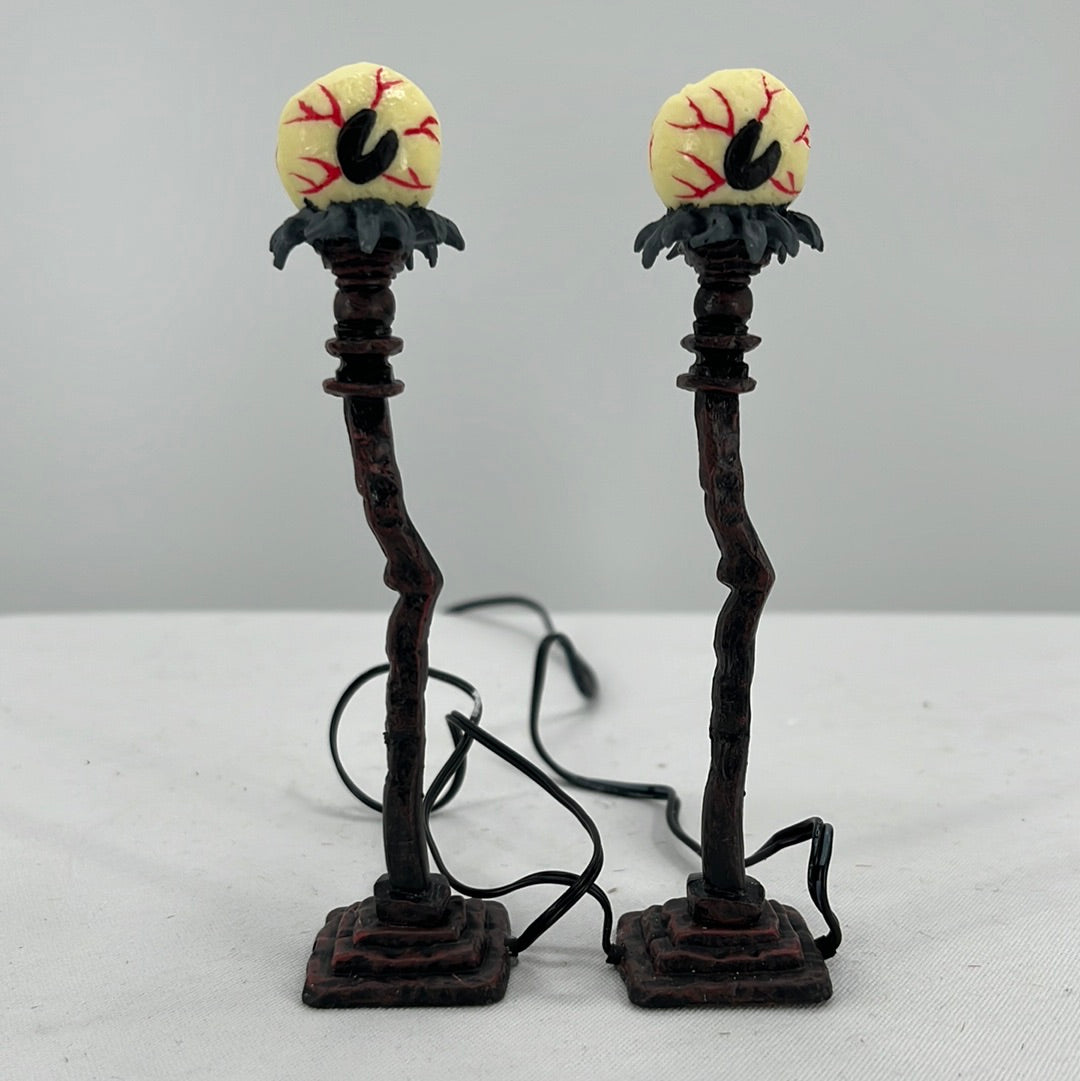 Department 56 Snow Village Halloween Eyeball Street Lights (Set of 2), front view.