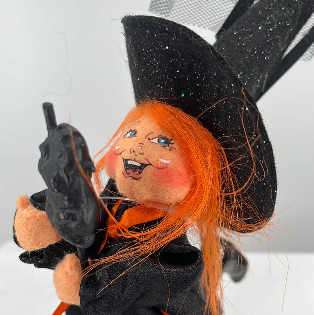 Halloween Annalee Doll Flying Witch, front view close-up.