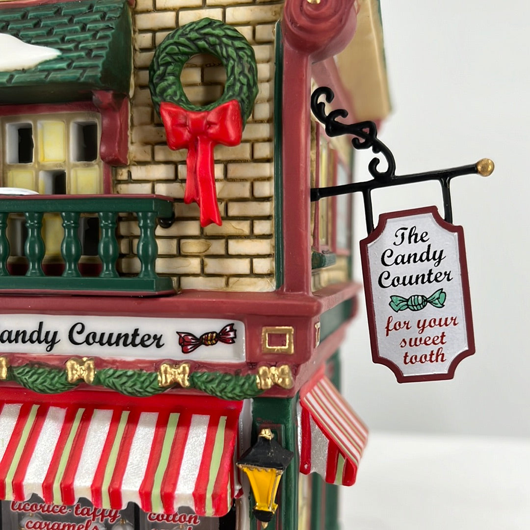 Department 56 Christmas in the City The Candy Counter, front view close-up.