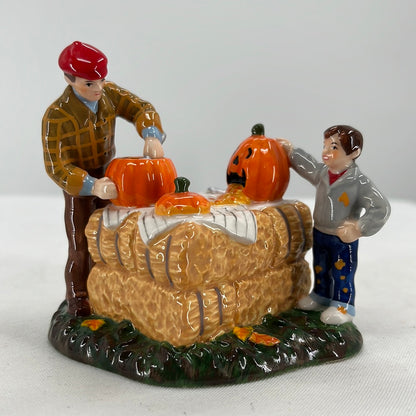 Department 56 Snow Village Halloween Gross… Pumpkin Guts ceramic accessory, front view close-up.