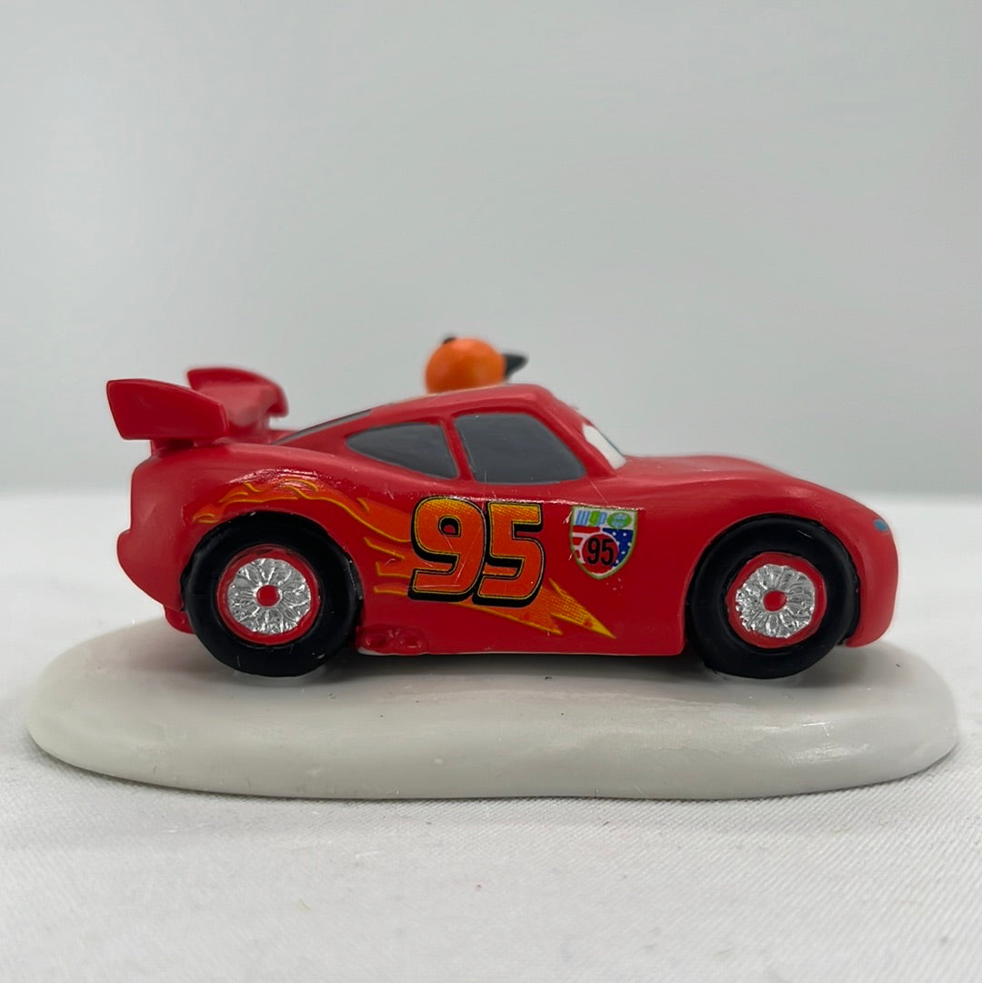 Department 56 North Pole Series Disney Pixar Cars Lightening Ready to Race, side view.