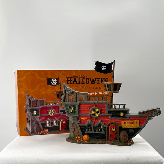 Department 56 Snow Village Halloween Mickey’s Pirate Cove lighted building, front view.