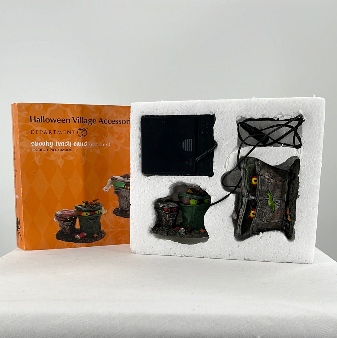 Department 56 Snow Village Halloween Spooky Trash Cans (set of 2) in packaging, front view.