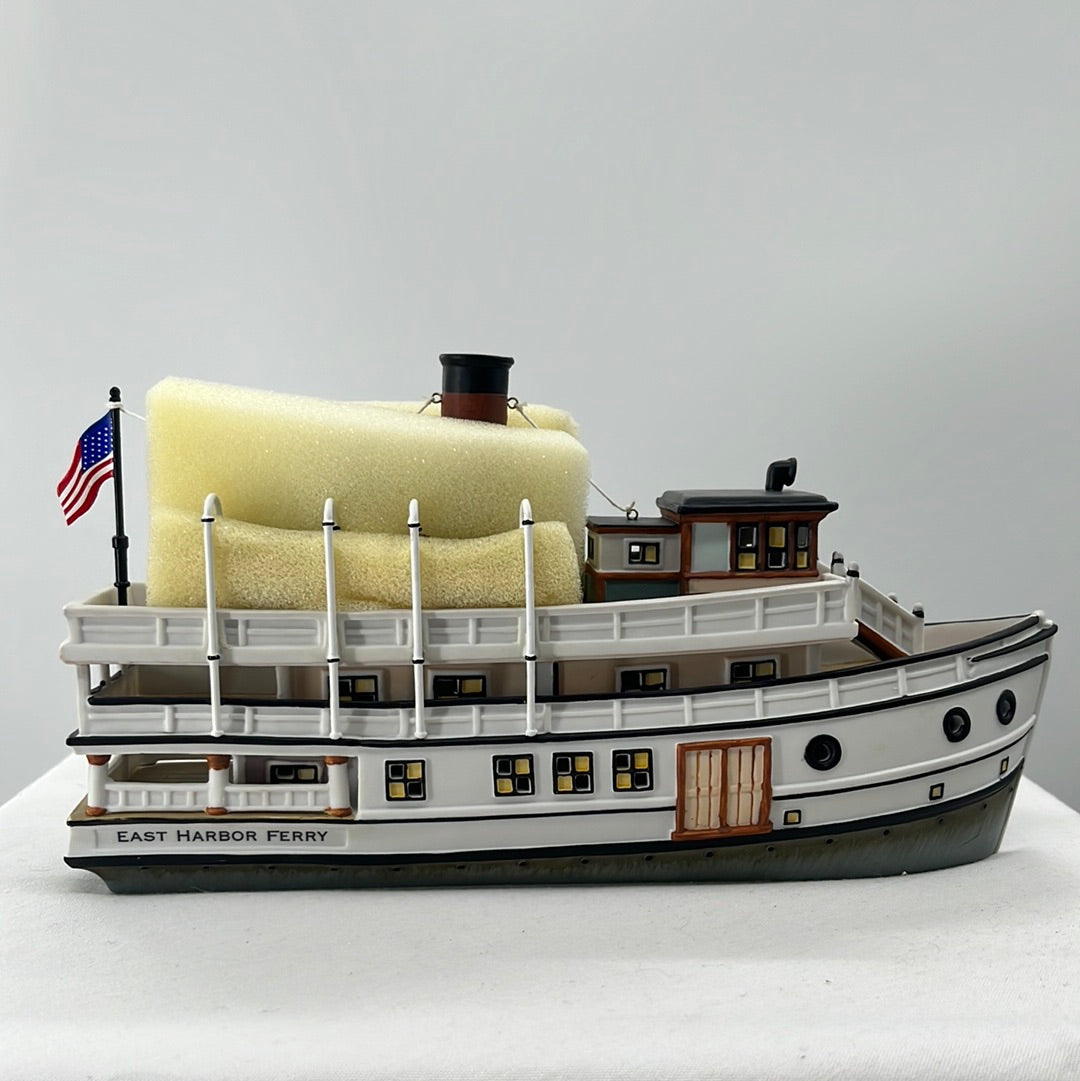 Department 56 Christmas in the City East Harbor Ferry (Set of 3) ferry, side view.