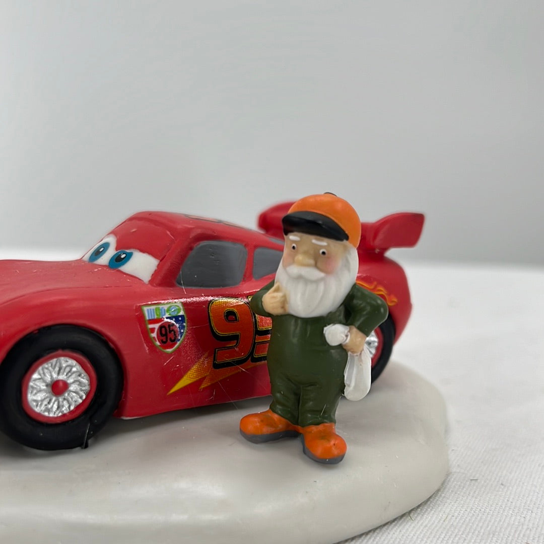 Department 56 North Pole Series Disney Pixar Cars Lightening Ready to Race, side view close-up.