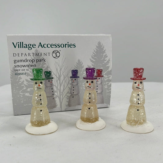 Department 56 Snow Village Gumdrop Park Snowmen (Set of 3) with original packaging, front view.