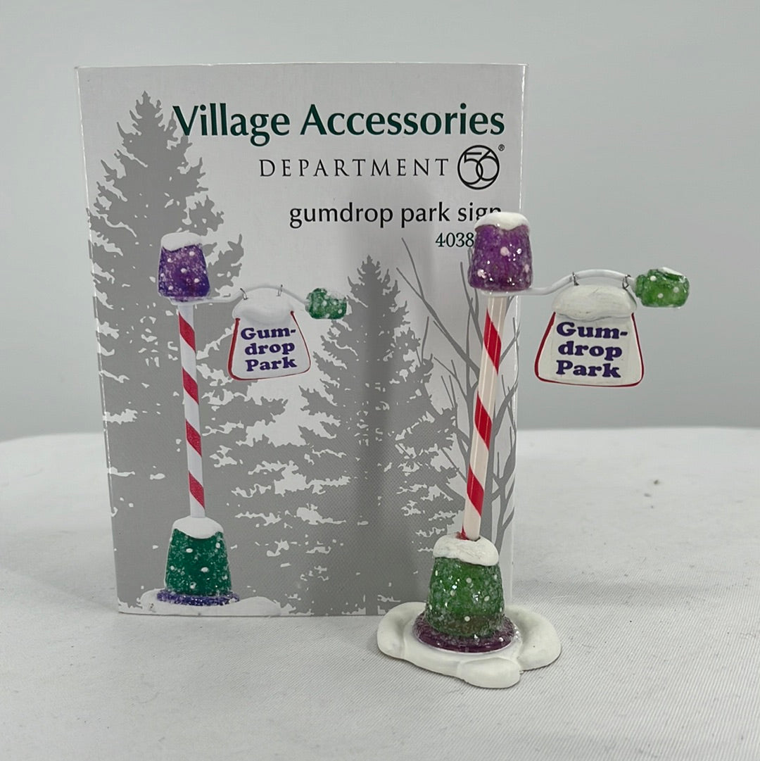 Department 56 Snow Village Gumdrop Park Sign with original packaging, front view.