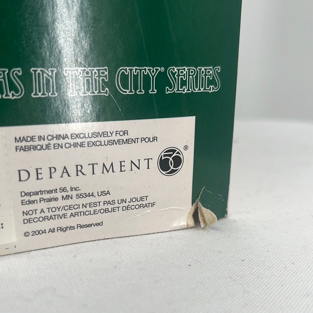 Department 56 Christmas in the City Royal Oil Company (Set of 2) packaging, close-up.