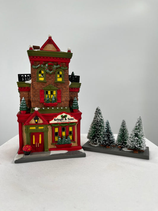 Department 56 Christmas in the City Kringle & Sons Boutique (Set of 2), front view.