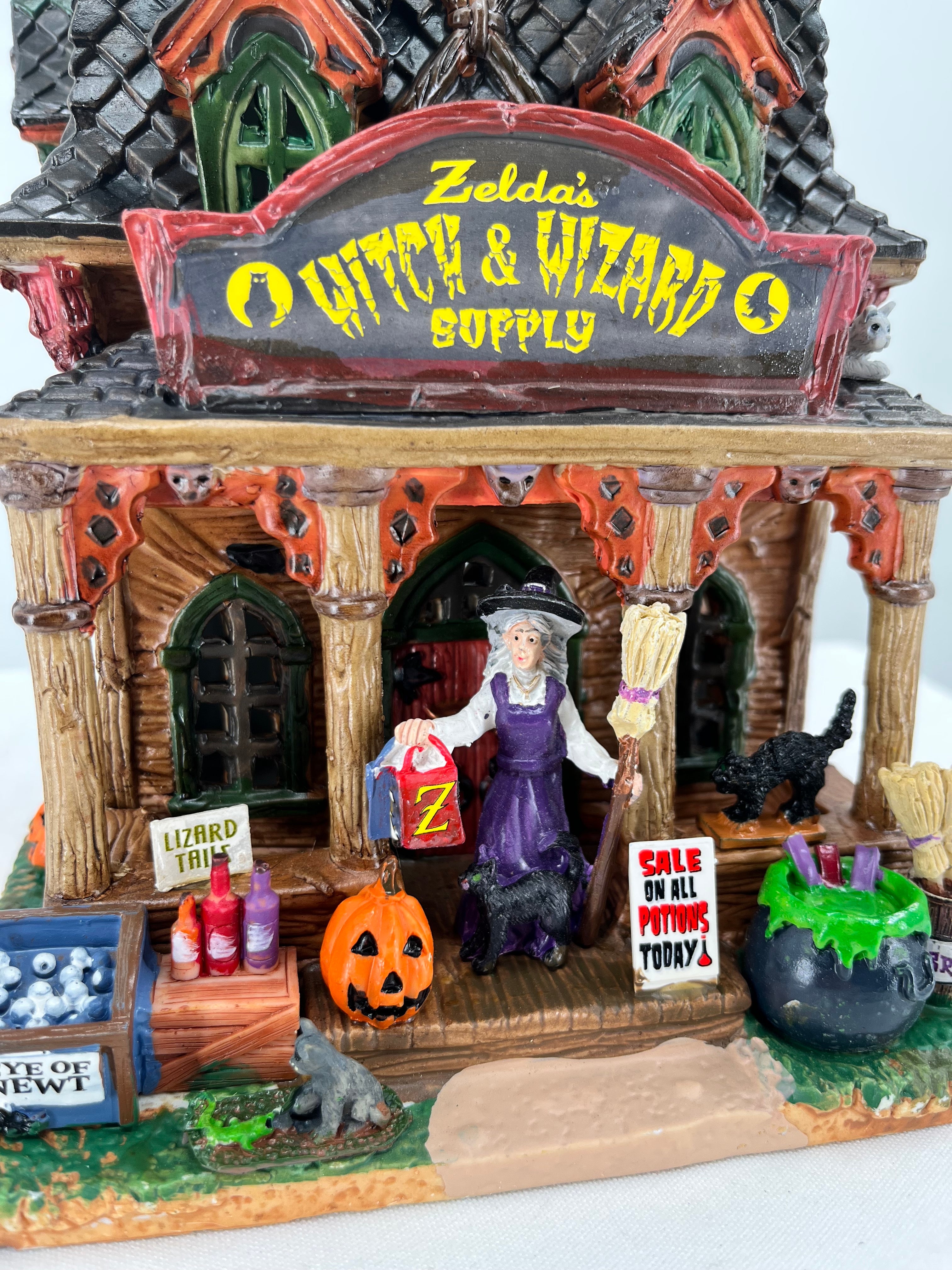 Lemax Spooky Town Zelda's Witch and Wizard Supply lighted building, front view close-up.