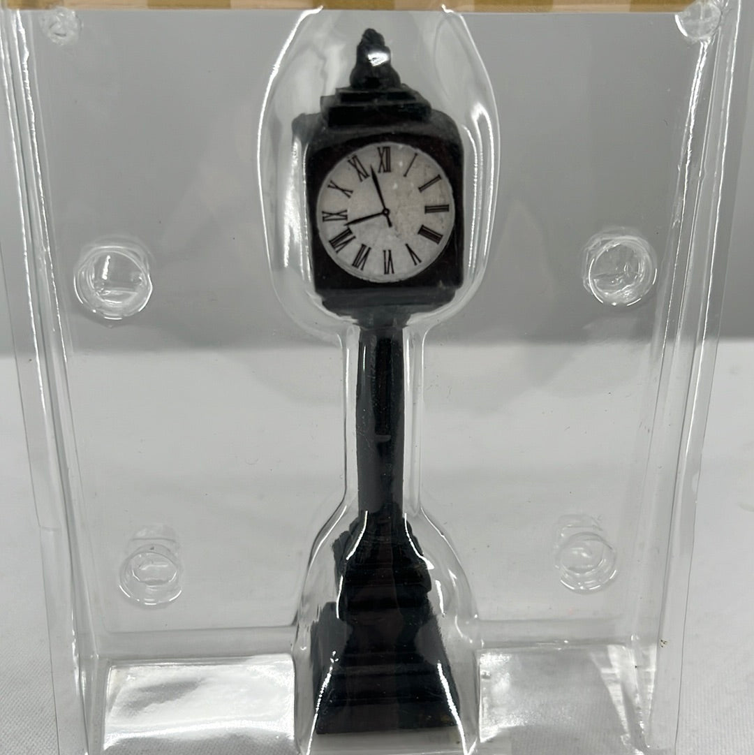 Lemax Christmas Village Street Clock accessory, front view close-up.