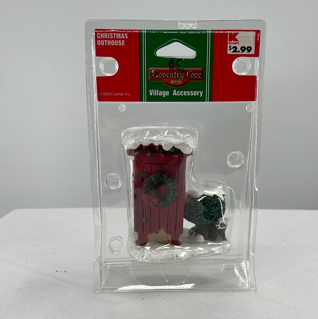 Lemax Christmas Village Christmas Outhouse figurine, front view.